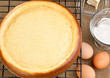 Whole fresh cheesecake with it's ingredients Whole fresh cheesecake with it's ingredients