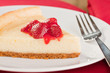 Fresh baked cheesecake with strawberry topping Fresh baked cheesecake with strawberry topping