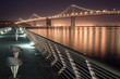 Bay Bridge at Night from pier in San Francisco