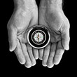 Compass in hands