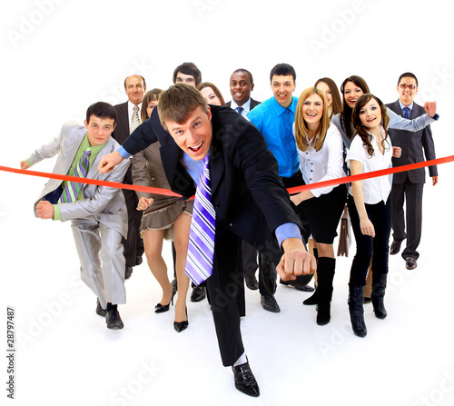 Photo: Businesspeople crossing the finish line Businesspeople crossing the finish line