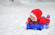 girl on sleigh