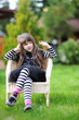 Sad adorable girl with long dark hair and beauty blue eyes Sad adorable girl with long dark hair and beauty blue eyes