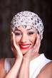 Foto: Beautiful ethnic fashion woman with hat Beautiful ethnic fashion woman with hat
