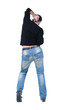 Young man dancing. Rear view. Young man dancing. Rear view.