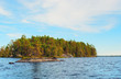 Stone islands on blue lake