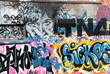 Abstract graffiti fragment on the textured brick wall