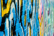 Abstract graffiti closeup on the textured brick wall