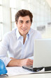 Architect sitting in front of laptop computer Architect sitting in front of laptop computer
