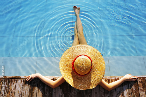 Photo: Woman at poolside Woman at poolside
