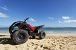 quad sur la plage
