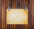 grunge paper on background wooden wall