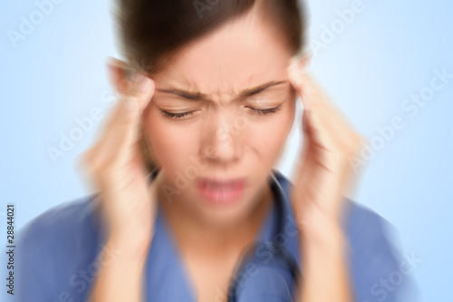 Foto: Nurse / doctor headache stress Nurse / doctor headache stress