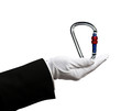 Hand holding carabiner