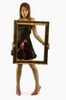 Woman Holding Picture Frame