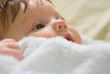 a little boy lying on sofa