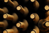 stacked up wine bottles in the cellar, dusty but tasty - Fine Art prints