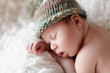 Newborn baby sleeping. Soft focus, shallow DoF.