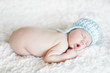 Newborn baby sleeping. Soft focus, shallow DoF.