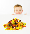 Young boy Looking at candy