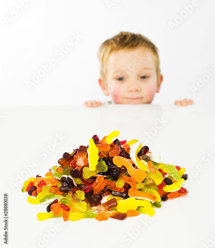 Photo: Young boy Looking at candy Young boy Looking at candy
