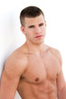 sexy male model topless on a seamless white background sexy male model topless on a seamless white background