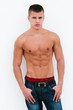 sexy male model topless on a seamless white background sexy male model topless on a seamless white background