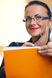 Young pretty woman with orange book in hands Young pretty woman with orange book in hands