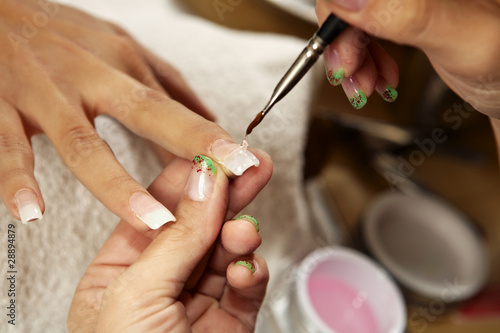 Photo: Making nails - applying gels and colors Making nails - applying gels and colors