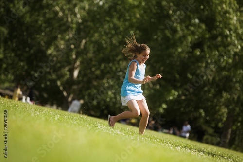 Photo: Girl Running In The Park Girl Running In The Park