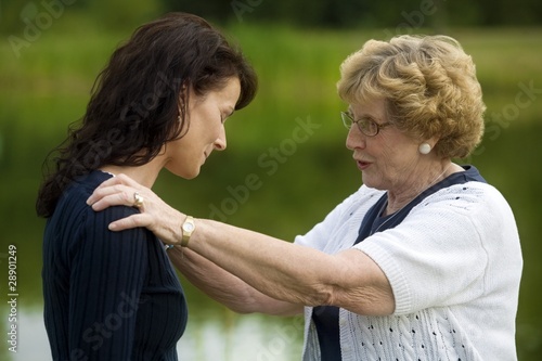 Photo: Senior Woman Consoling Her Daughter Senior Woman Consoling Her Daughter