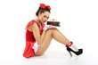 Young beautiful woman with a cake.