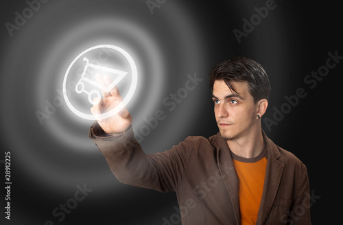 Photo: man pressing a touchscreen button man pressing a touchscreen button