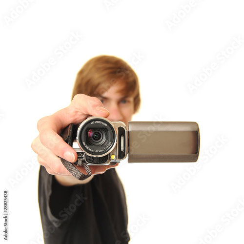 Photo: Young adult holding camcorder Young adult holding camcorder