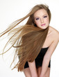 Beautiful young woman with  long straight hair