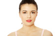 Beautiful woman's face with fresh clean skin