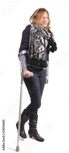 Photo: Smiling woman on crutches Smiling woman on crutches