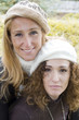 Two young women with hats