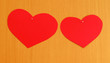 Two hearts nailed to wooden board Two hearts nailed to wooden board