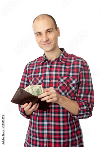 Photo: man holding some dollars man holding some dollars