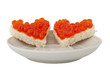 Two pieces of bread in the form of a heart and red caviar Two pieces of bread in the form of a heart and red caviar