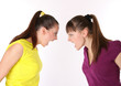 two girls shouting at each other two girls shouting at each other
