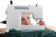 Seamstress work on the sewing-machine Seamstress work on the sewing-machine