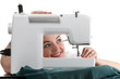 Seamstress work on the sewing-machine Seamstress work on the sewing-machine