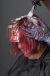Photo: Hair stylist applying color Hair stylist applying color