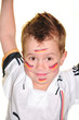 Fussballfan reisst die Arme hoch