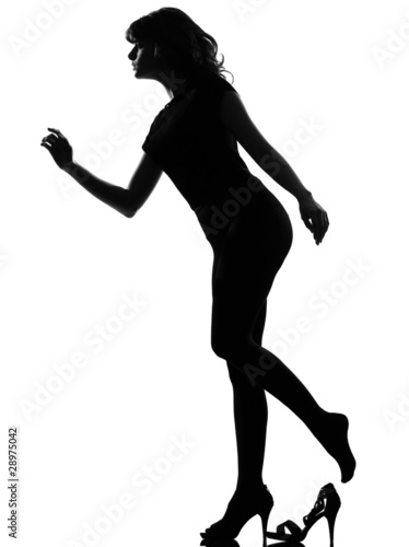 Photo: silhouette Cinderella woman losing her shoe silhouette Cinderella woman losing her shoe