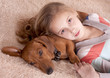 Foto: teenager girl and dog dachshund teenager girl and dog dachshund