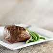 steak with green beans and copyspace