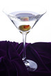 Classic Martini Cocktail Sitting on Purple Velvet